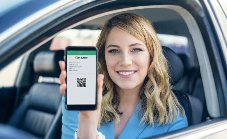 Woman showing smartphone with a QPass Code Invitation